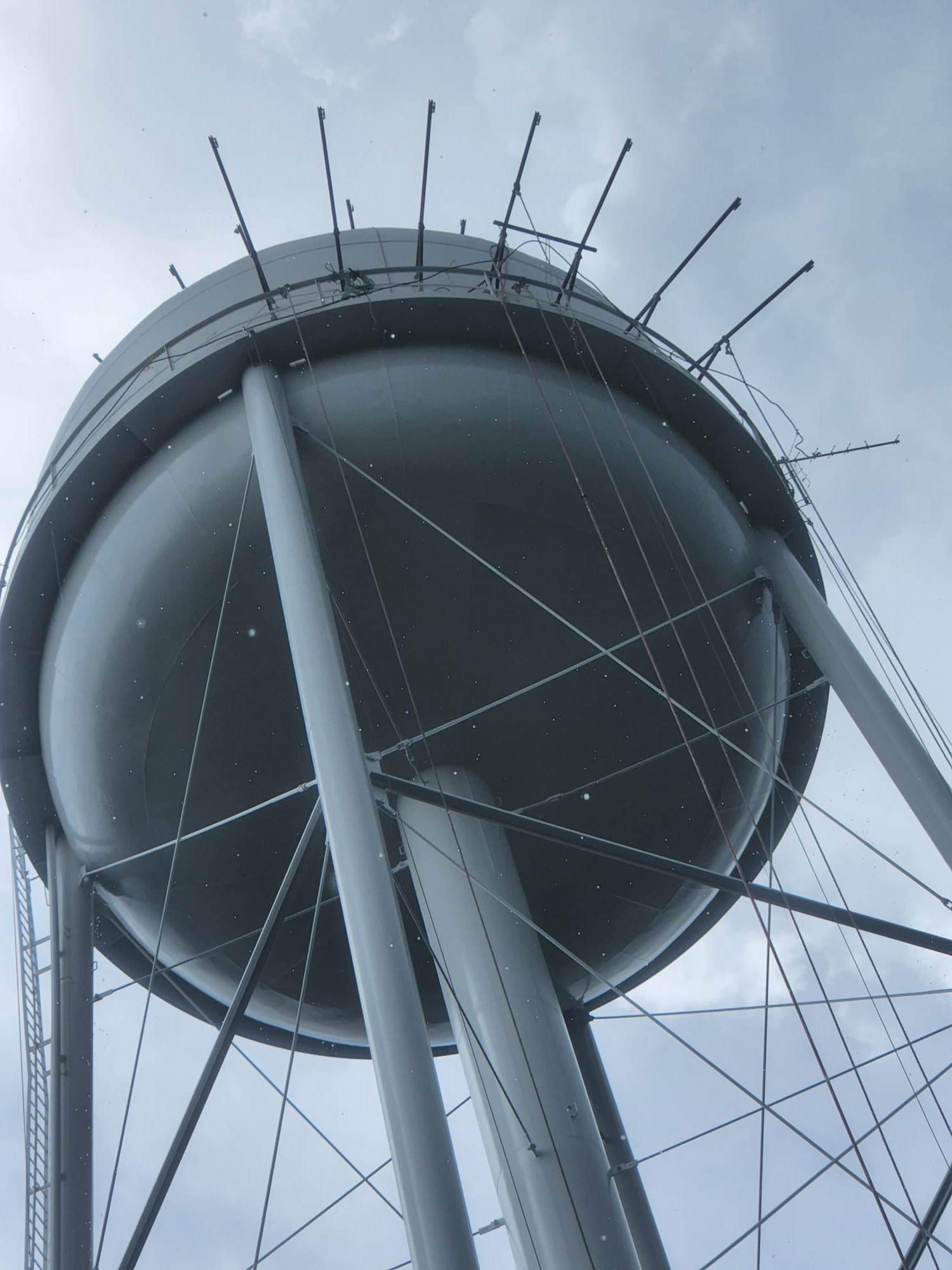 Containment rigging on spheroid water tower — JCR Industrial Coatings